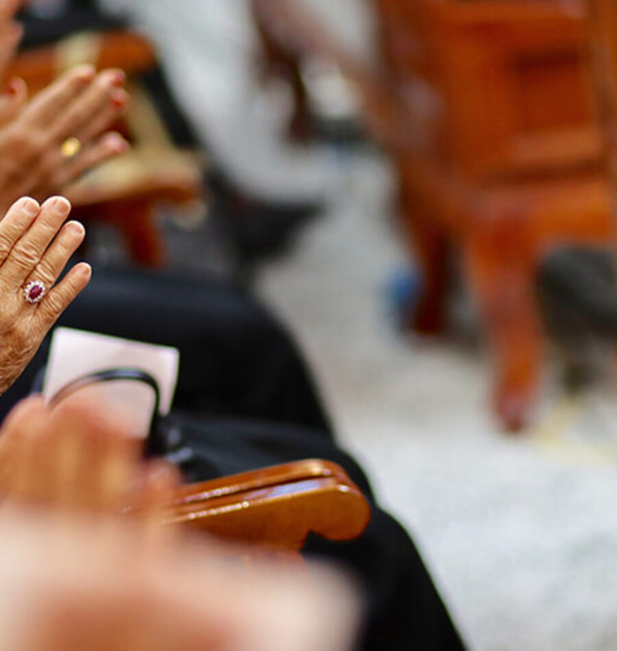 midsection-people-praying-church (1)